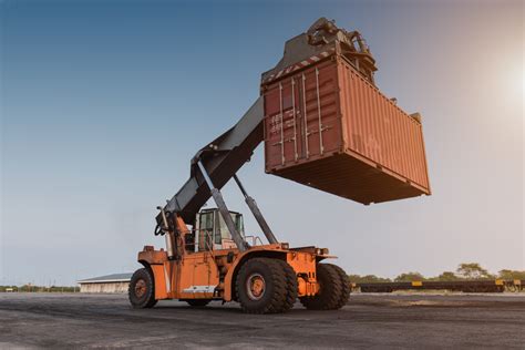 can a skid steer lift a 20ft container|Moving shipping container with tractor .